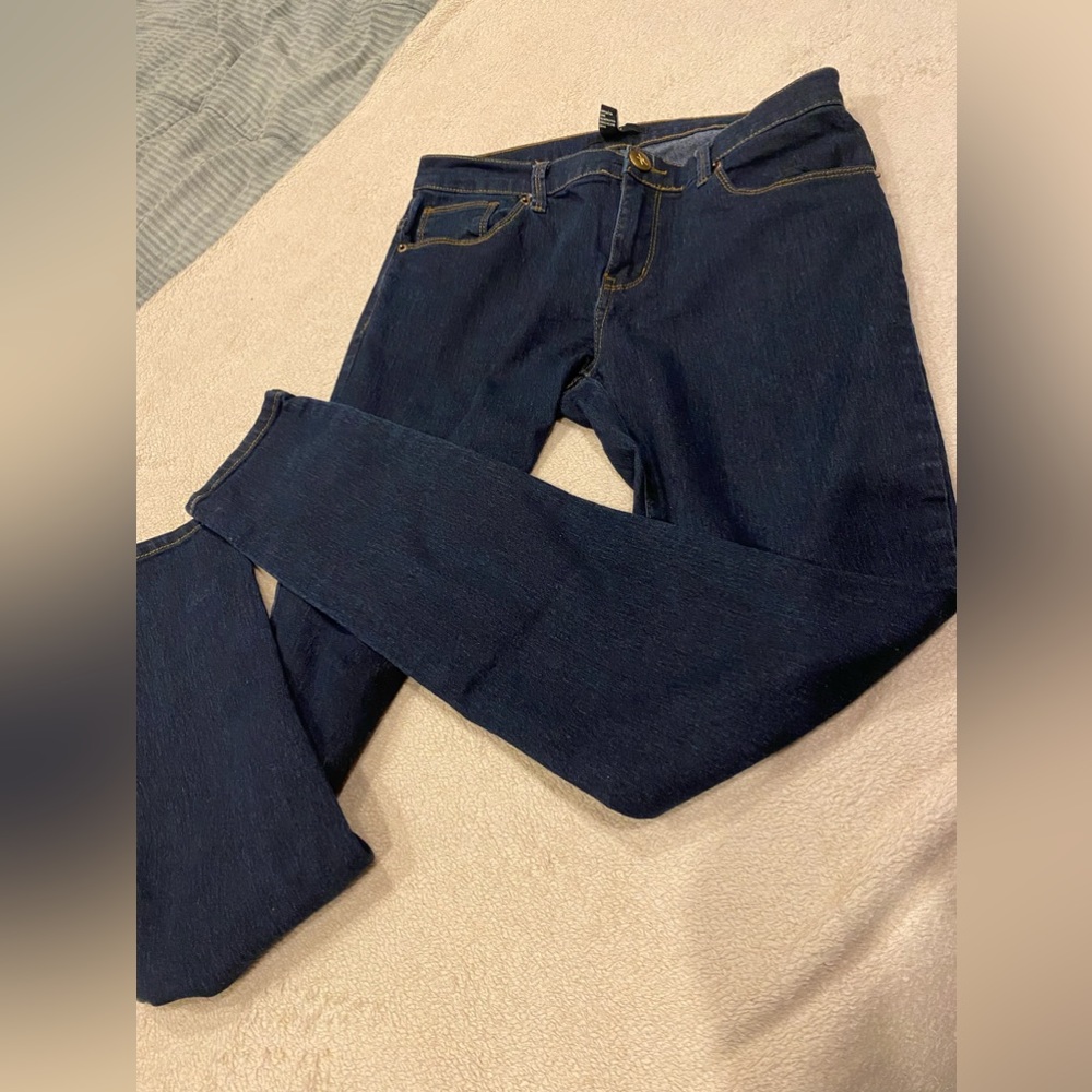 US 29 or size 8 dark blue stretch skinny XXI jeans
